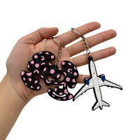 Porte-clés en PVC personnalisé en gros, forme abstraite, design avion, en caoutchouc souple découpé, souvenir, cadeau promotionnel en vrac