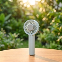 Ventilateur portable mini USB rechargeable 2026 en plastique pour extérieur, trois vitesses, alimentation électrique, refroidissement par glace