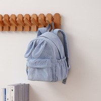Sac à dos en velours côtelé personnalisé en gros avec oreilles de lapin, poche avant zippée, poches latérales à cordon de serrage, bretelles réglables