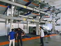 Système de stationnement automatique multi-étages intelligent à puzzle rotatif coulissant en acier, contrôle PLC, capacité de charge 2000 kg, 220V/380V