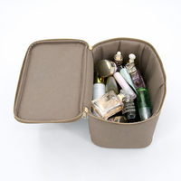 Sac de toilette de voyage en cuir PU de luxe à grande capacité avec logo personnalisé, fermeture éclair, sac à maquillage portable, étui de rangement pour cosmétiques