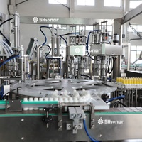 Machine de remplissage et de bouchage automatique haute précision à 4 têtes pour flacons pulvérisateurs sans goutte