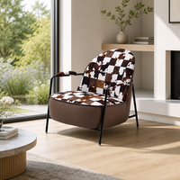 Fauteuil de salon moderne en suède color-block de luxe avec structure en acier carbone durable