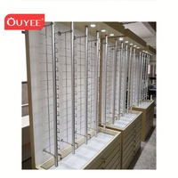Présentoir mural LED verrouillable pour lunettes de soleil et de vue avec tiges optiques en verre trempé - Marque OUYEE - Garantie 3 ans