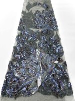 Tissu en dentelle brodée de perles de luxe