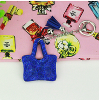 Koningsblauwe handtasvormige, glinsterende, volledig met strass versierde hanger met kwastjes, hoogwaardige hangende hanger, best verkochte sleutelhanger