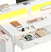 Bureau d'ordinateur moderne en bois extensible pour la maison, avec structure en acier, huche surélevée, LED intégrées, double tiroir et gestion des câbles dissimulée
