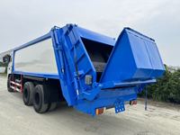 Camion à ordures compacteur d'occasion de 20 mètres cubes à double essieu arrière, châssis Dongfeng, moteur Yuchai, boîte de vitesses rapide à 8 rapports avec réservoir d'eaux usées