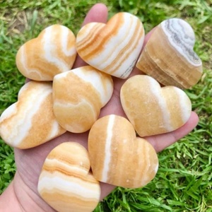 Vente en gros de pierres de palmier en calcite orange naturelle polie de haute qualité pour la décoration de la maison, l'art et les objets de collection - Product Image 6