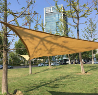 Voile d'ombrage beige respirante en maille tissée pour parc, allée et patio extérieurs, protection solaire