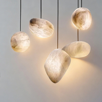 Luminaire suspendu moderne Seeky en albâtre, forme de pierre irrégulière, pour îlot de cuisine, salle à manger