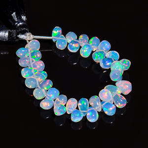 Cuentas de ópalo etíope natural personalizadas OEM con forma de lágrima y cuentas de ópalo etíope de peso 22,50 Ct - Product Image 1