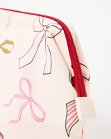 Sac de voyage portable personnalisé avec logo, pochette de toilette à pompon pour femme, sac à maquillage imprimé nœud pour femme, vente en gros