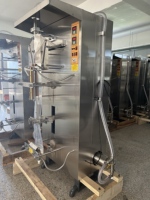Machine de remplissage et de scellage verticale ESKO pour liquides (shampoing, détergent, huile, eau, ketchup, mayonnaise) en sachets à soudure dorsale