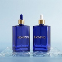 Vente en gros de flacons de parfum vides haut de gamme bleus 30ml 50ml 100ml, flacon de parfum carré en verre transparent