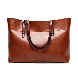 Buy Online Luxury Unisex Bags Handmade Leather Handbags Fashionable Western Style Waterproof Animal Prints Zipper Closure Laptop - Product Image 1