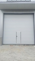 Porte de levage industrielle automatique segmentée surélevée pour entrepôt d'usine, personnalisée
