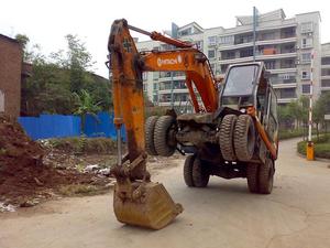 Excavatrice sur pneus Hitachi EX100WD d'occasion fabriquée au Japon à vendre Excavatrice sur pneus Hitachi 100 d'occasion en bon état - Product Image 2