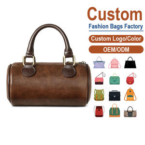 Bolso cilíndrico de cuero genuino de grano completo – Acabado vintage en marrón oscuro con asa superior y estilo de lujo hereditario - Product Image 1