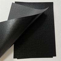Feuille de papier gaufré effet crocodile noir 120 g/m², recto brillant, papier spécial cartonné