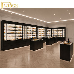 Arredamento Personalizzato di Lusso per Negozio di Profumi, Design Premium Nero e Oro, Vetrina Espositiva con Tavoli a Isola - Product Image 1