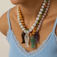 Collier long bohème pour femme avec pendentif poisson en pierre sculptée, perles imitation jade, chaîne de pull, forme animale, style vintage