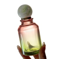 Flacon de parfum rond en verre de luxe 100 ml, personnalisable, vide et rechargeable, avec boîte élégante et pulvérisateur à pompe en option