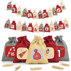 Bolsa con cordón de tela cuadrada inspirada en el calendario de Navidad al por mayor de fábrica, suministros decorativos para interiores de moda ecológicos - Product Image 1