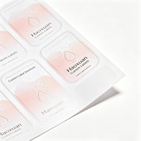 Étiquettes adhésives transparentes en PET avec encre blanche et film mat pour emballage de bouteilles de spray de soin intime Haoxuan OEM