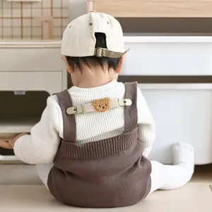 MU sıcak satış renkli evrensel bebek tulum elbise giyinmek süsler kaymasını bebek giysileri çocuk omuz askıları önlemek