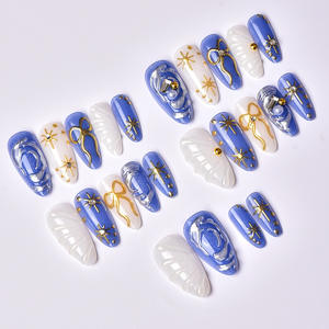 24 faux ongles amande plaqués or faits main, style INS, avec étoiles 3D, nœuds et strass à coller pour manucure - Product Image 3