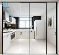 Portes pliantes en aluminium ultra-minces noires multi-rails, panoramiques, avec verre au sol, pour cuisine intérieure, résistantes à l'eau, pour villa moderne en bord de mer