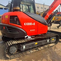 Excavadora de cadenas usada NOVUS KX080 8T con motor y sistema hidráulico confiables, ideal para excavación y demolición en la construcción.