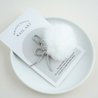 Une variété de porte-clés en forme de boule de lapin Rex populaires, pendentifs en peluche mignons, pendentifs de sac en forme de boule, nouveau style d'hiver