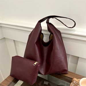 Juego <span class=keywords><strong>de</strong></span> <span class=keywords><strong>dos</strong></span> piezas <span class=keywords><strong>de</strong></span> gran capacidad Retro 2024 Color sólido nuevo Simple e informal viaje axila bolso <span class=keywords><strong>de</strong></span> mano <span class=keywords><strong>de</strong></span> un solo hombro para Aut - Product Image 1