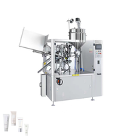 Machine de remplissage et de scellage automatique de tubes souples avec système de scellage à air chaud et codage par lots pour l'emballage de tubes en plastique et laminés