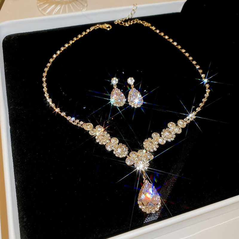 Ensemble de boucles d'oreilles et collier goutte d'eau dorée 2 pièces