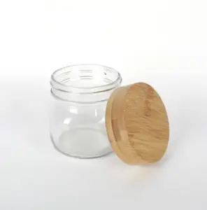 Wholesale FDA Grade Cylinder Jar With Costom Acacia Bamboo Wood For Coffee Bean Candy Storage Glass Jars With Bamboo Wooden Lids