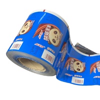 Rouleau de film plastique d'étanchéité en cellulose souple personnalisé pour l'emballage de biscuits pour chocolat, sucre, lait, biscuits, gelée, aliments