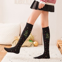 Chaussettes longues chaudes et confortables pour l'hiver, à pois et à motifs de Noël, pour femmes