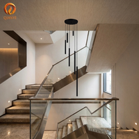 Lampe suspendue verticale pour escalier, design atmosphérique, finition noir mat, fixation filaire, artisanat fait main pour magasin, restaurant, bar