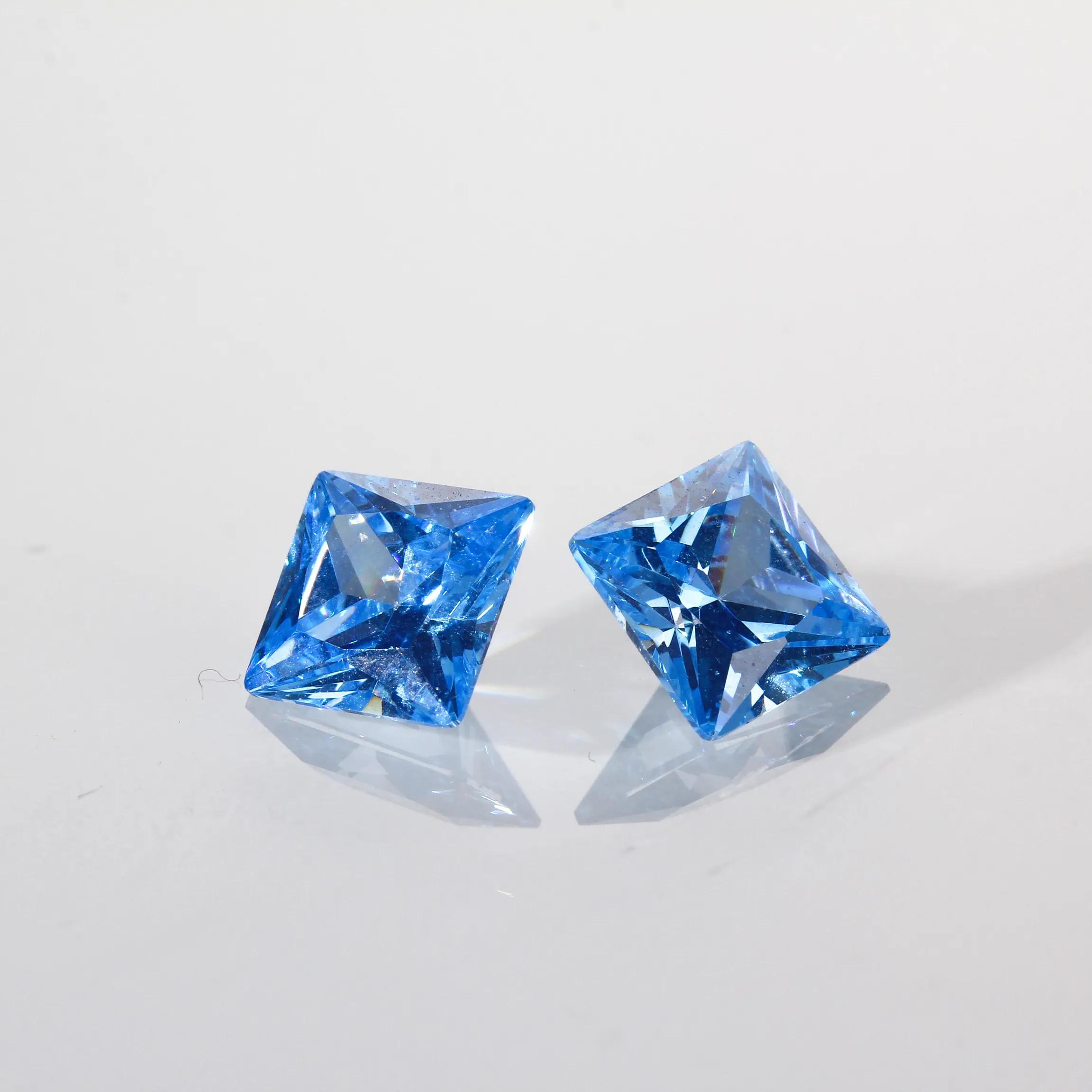 Atacado <span class=keywords><strong>esmeralda</strong></span> <span class=keywords><strong>corte</strong></span> de cristal zircão azul safira pedra de alta qualidade moda gelo zircão para marcação de joias