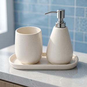 Ensemble de salle de bain minimaliste en céramique avec distributeur de savon et plateau ovale, facile à nettoyer - Product Image 1