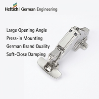 Charnière de meuble Hettich Sensys 8657i à fermeture amortie, à ouverture à 165 degrés, à montage semi-suréglable, nickel, à visser, pour cuisine