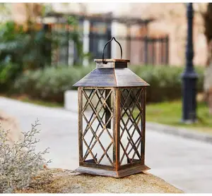 Solar powered LED lantern with flickering candle light