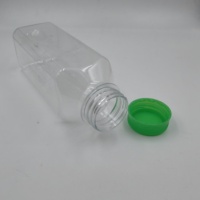 Bouteille de boisson de jus en plastique PET jetable en gros bouteille d'eau en plastique transparente vide mince avec couvercle bouteille de boisson
