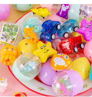 Jouets promotionnels en forme de capsule macaron multicolores 47*55MM, poupées en plastique bon marché pour distributeurs automatiques, garantie 1 an
