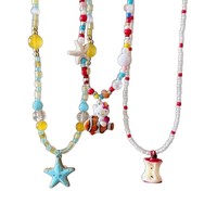 Collier à perles coloré en forme d'étoile de mer orange tendance pour les vacances à la plage et les parcs d'attractions, cadeau mignon pour femmes, chaîne de clavicule
