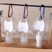 Flacon pulvérisateur PETG 50 ml personnalisé en usine avec porte-clés, flacon cœur pour lotion, conteneur liquide pour soins personnels, emballage