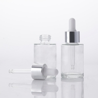 Flacon compte-gouttes en verre transparent de 30 ml pour sérum, forme cylindrique, sérigraphie, finition mate givrée, pour produits essentiels de soin de la peau et gouttes pour les yeux